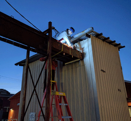 "We're All Downstream" 14' x 60' Dismantling original structure. 2017