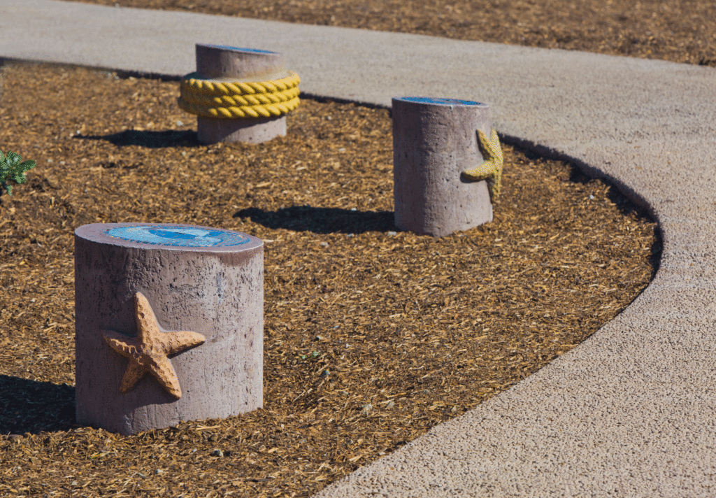 "We Are Seacliff" 38 cement pylons with mosaics tops. 2016