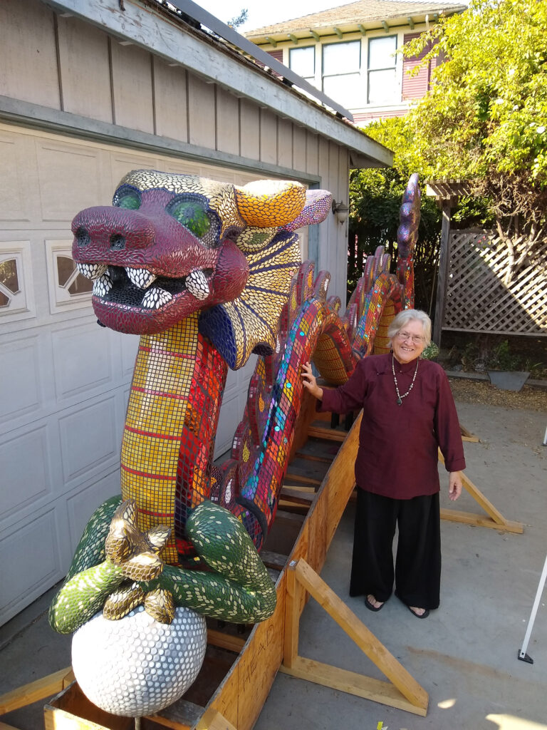 A Chinese elder comes to bless the dragon.